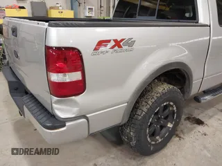 2005 Ford F-150 XLT with VIN 1FTPX14555FA52671, listed as a IAAI auction lot 41733466 with 214,826 mi miles. Bid and sale history available at carsss.com. Image 6.
