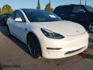 2023 Tesla Model 3 with VIN 5YJ3E1EA7PF462332, listed as a IAAI auction lot 41968769 with 50,855 mi miles. Bid and sale history available at carsss.com. Image 1.