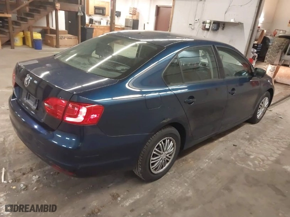 2014 Volkswagen Jetta Sedan S with VIN 3VW2K7AJ7EM438342, listed as a IAAI auction lot 41726743 with 110,721 mi miles. Bid and sale history available at carsss.com. Image 4.