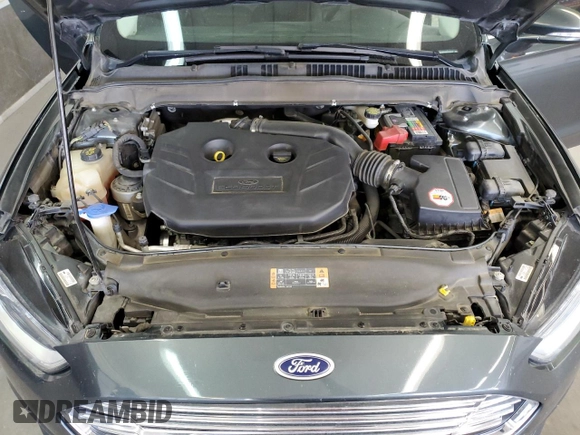 2015 Ford Fusion SE z VIN 3FA6P0H98FR295646, wystawiony jako Copart lot #57055105 z przebiegiem 121 515 mil mil oraz Szkoda całkowita • Salvage title. Historia ofert i sprzedaży dostępna na DreamBid. Obrazek 11.