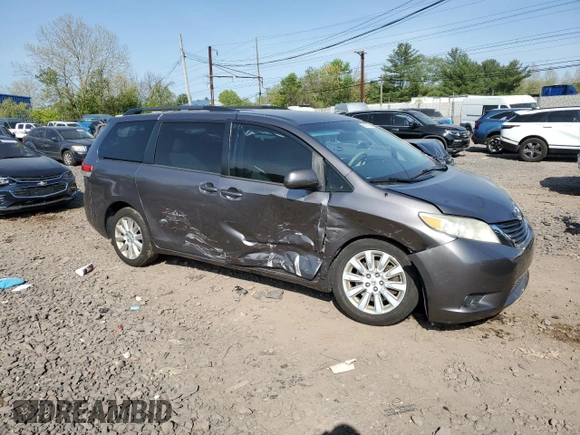 2014 Toyota Sienna LE with VIN 5TDJK3DC0ES080201, listed as a Copart auction lot 55147745 with 133,216 mi miles and Salvage Title. Bid and sale history available at DreamBid. Image 4.