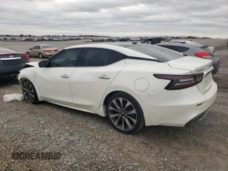 2019 Nissan Maxima Platinum z VIN 1N4AA6AV0KC363601, wystawiony jako Copart lot #49549415 z przebiegiem 75 551 mil mil oraz Szkody całkowita. Historia ofert i sprzedaży dostępna na DreamBid. Obrazek 2.