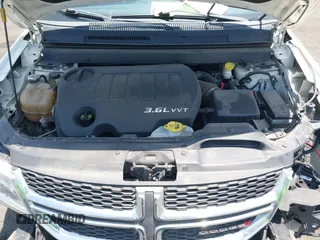 2013 Dodge Journey SXT with VIN 3C4PDCBG4DT696966, listed as a IAAI auction lot 42555632 with 144,927 mi miles and . Bid and sale history available at DreamBid. Image 10.