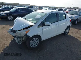 2013 Toyota Yaris L with VIN JTDKTUD35DD571249, listed as a IAAI auction lot 41589605 with Not Provided miles. Bid and sale history available at carsss.com. Image 2.