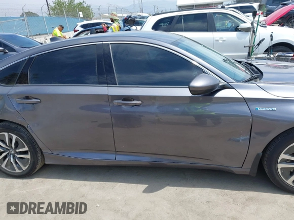 2020 Honda Accord with VIN 1HGCV3F11LA015901, listed as a IAAI auction lot 42022659 with 131,865 mi miles and . Bid and sale history available at DreamBid. Image 13.
