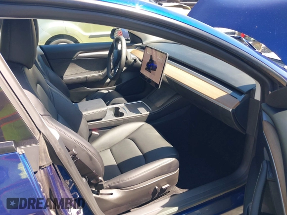 2023 Tesla Model 3 z VIN 5YJ3E1EA9PF639141, wystawiony jako IAAI lot #42167773 z przebiegiem 57 459 mil mil oraz . Historia ofert i sprzedaży dostępna na DreamBid. Obrazek 5.
