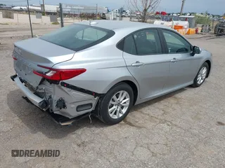 2025 Toyota Camry LE with VIN 4T1DAACK8SU512341, listed as a IAAI auction lot 42210426 with 14,276 mi miles and . Bid and sale history available at DreamBid. Image 4.
