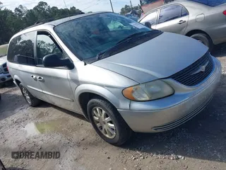 2003 Chrysler Town & Country LX with VIN 2C4GP44L03R203678, listed as a IAAI auction lot 41293296 with 210,827 mi miles and . Bid and sale history available at DreamBid. Image 1.
