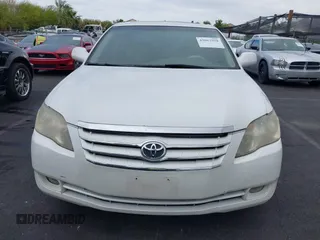 2007 Toyota Avalon XL with VIN 4T1BK36B97U252227, listed as a IAAI auction lot 42067958 with 245,781 mi miles. Bid and sale history available at carsss.com. Image 6.