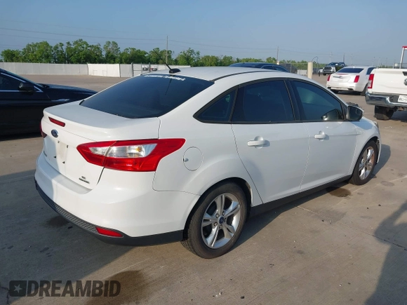 2014 Ford Focus SE with VIN 1FADP3F26EL163285, listed as a IAAI auction lot 42174124 with 172,016 mi miles and . Bid and sale history available at carsss.com. Image 4.