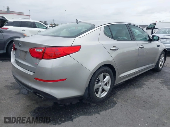 2015 Kia Optima LX with VIN KNAGM4A78F5584534, listed as a IAAI auction lot 42182927 with 63,225 mi miles and . Bid and sale history available at carsss.com. Image 4.