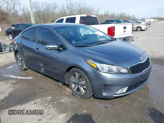 2018 Kia Forte LX with VIN 3KPFL4A79JE194864, listed as a IAAI auction lot 41657793 with 128,256 mi miles and . Bid and sale history available at DreamBid. Image 1.