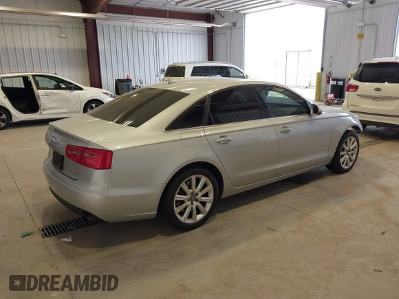 2015 Audi A6 Premium z VIN WAUFFAFC3FN021983, wystawiony jako IAAI lot #42105719 z przebiegiem 104 143 mil mil oraz . Historia ofert i sprzedaży dostępna na DreamBid. Obrazek 4.