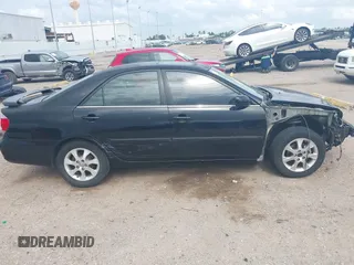 2005 Toyota Camry LE with VIN 4T1BF32K15U091945, listed as a IAAI auction lot 42124503 with 212,951 mi miles and . Bid and sale history available at DreamBid. Image 14.