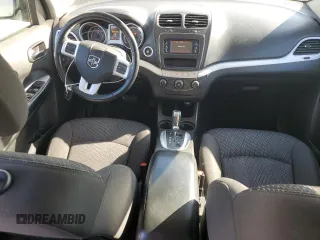 2017 Dodge Journey SXT with VIN 3C4PDCBB8HT675449, listed as a Copart auction lot 88999075 with 105,765 mi miles and Salvage Title. Bid and sale history available at DreamBid. Image 8.