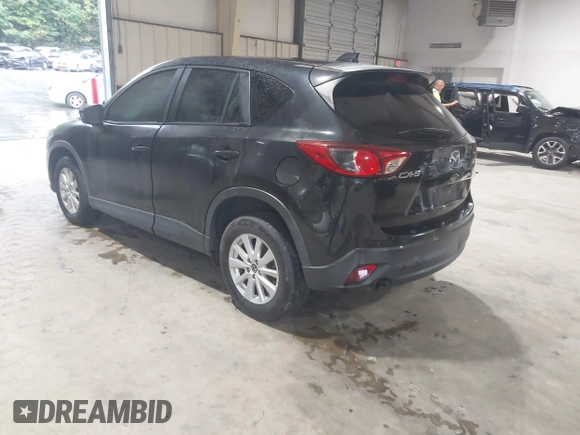 2013 Mazda CX-5 Sport with VIN JM3KE2BE3D0168842, listed as a IAAI auction lot 42653618 with 256,392 mi miles and . Bid and sale history available at DreamBid. Image 3.