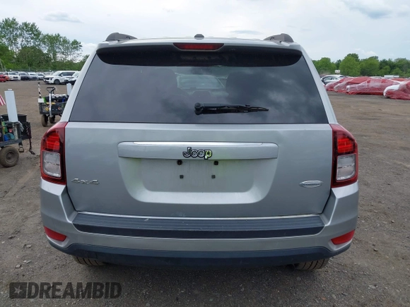 2017 Jeep Compass Latitude with VIN 1C4NJDEB0HD112001, listed as a IAAI auction lot 42352409 with 151,352 mi miles and . Bid and sale history available at DreamBid. Image 16.