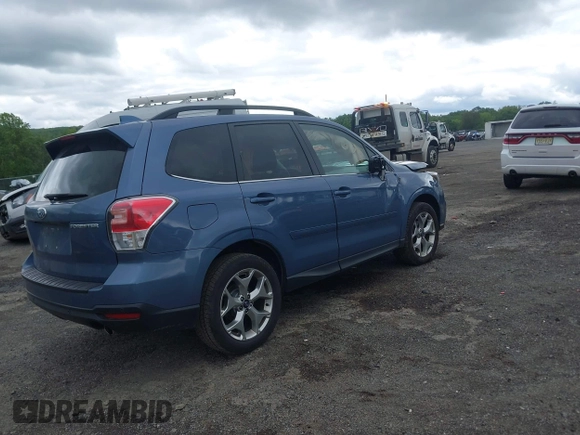 2018 Subaru Forester Touring with VIN JF2SJAWC5JH528330, listed as a IAAI auction lot 42344618 with 62,446 mi miles and . Bid and sale history available at DreamBid. Image 4.