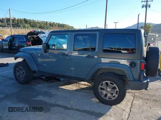 2014 Jeep Wrangler Unlimited Rubicon X with VIN 1C4BJWFG3EL134522, listed as a IAAI auction lot 41221381 with 66,897 mi miles and . Bid and sale history available at DreamBid. Image 14.