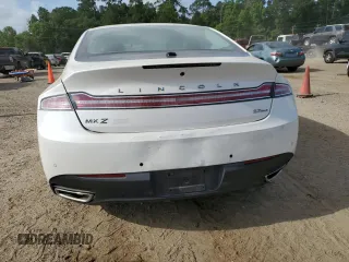 2013 Lincoln MKZ с VIN 3LN6L2JK3DR810768, выставлен на аукционе Copart как лот 56665585 с пробегом 172 770 миль миль и Списание • Salvage title. История ставок и продаж доступна на DreamBid. Изображение 6.