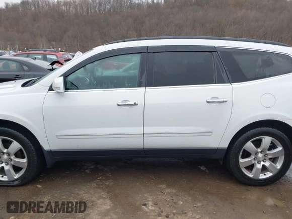 2017 Chevrolet Traverse Premier with VIN 1GNKVJKD5HJ324803, listed as a IAAI auction lot 41464714 with 98,753 mi miles and . Bid and sale history available at DreamBid. Image 14.