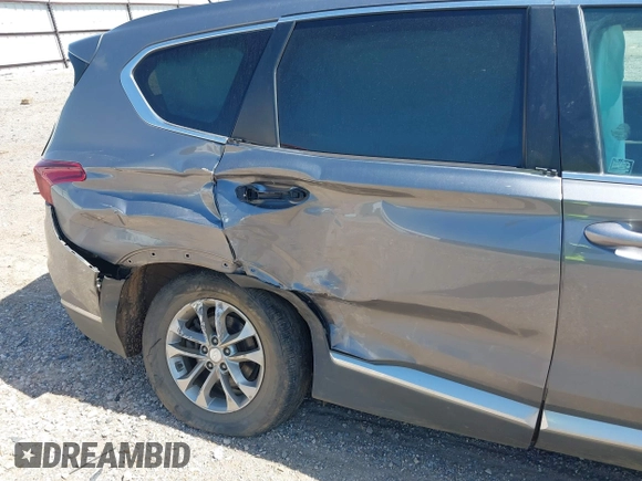 2020 Hyundai Santa Fe SE with VIN 5NMS23AD8LH178541, listed as a IAAI auction lot 41779711 with 86,036 mi miles and . Bid and sale history available at DreamBid. Image 6.