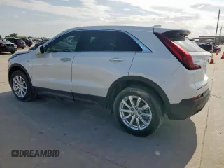 2021 Cadillac XT4 FWD Luxury z VIN 1GYAZAR49MF084676, wystawiony jako Copart lot #59765515 z przebiegiem 32 480 mil mil oraz Czysty tytuł • Clean title. Historia ofert i sprzedaży dostępna na DreamBid. Obrazek 2.