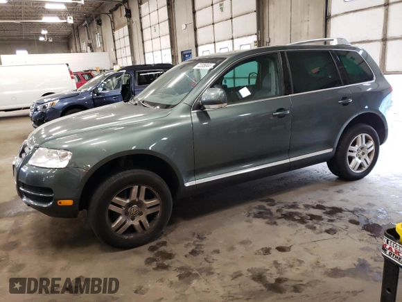 2004 Volkswagen Touareg z VIN WVGCM67L94D032492, wystawiony jako Copart lot #72205044 z przebiegiem 98 482 mil mil oraz Czysty tytuł • Clean title. Historia ofert i sprzedaży dostępna na DreamBid. Obrazek 1.