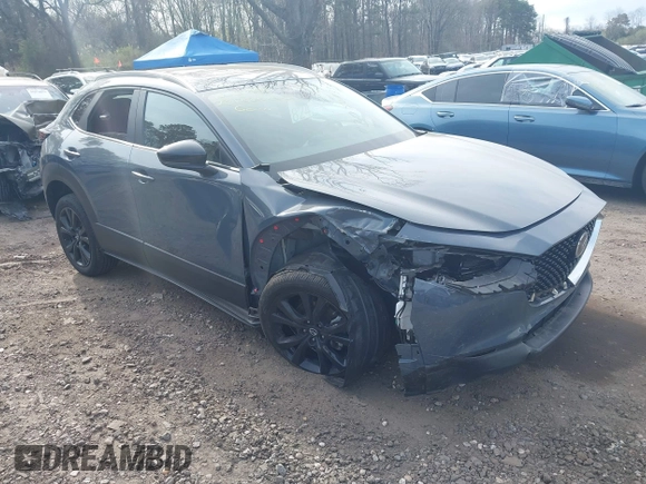 2023 Mazda CX-30 S Carbon Edition with VIN 3MVDMBCM8PM502891, listed as a IAAI auction lot 42050533 with 20,035 mi miles and . Bid and sale history available at DreamBid. Image 1.