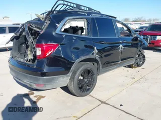 2021 Honda Pilot Special Edition with VIN 5FNYF5H22MB022187, listed as a IAAI auction lot 41715769 with 65,617 mi miles and . Bid and sale history available at DreamBid. Image 4.