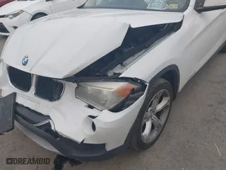 2013 BMW X1 xDrive35i with VIN WBAVM5C53DVV89288, listed as a IAAI auction lot 41609285 with 114,659 mi miles. Bid and sale history available at carsss.com. Image 6.