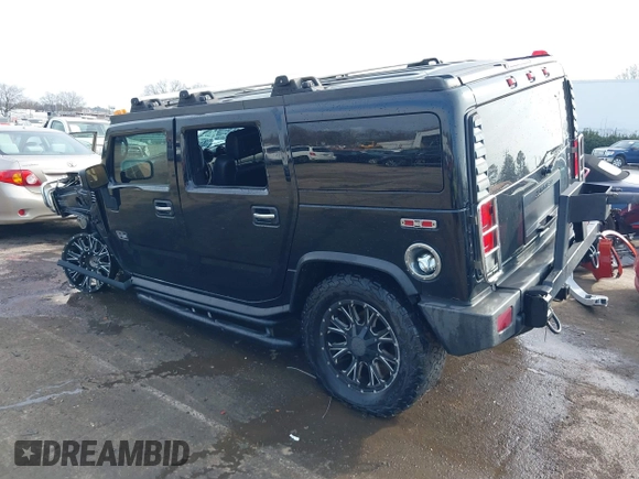 2006 Hummer H2 with VIN 5GRGN23U06H113353, listed as a IAAI auction lot 41476649 with 165,370 mi miles. Bid and sale history available at carsss.com. Image 3.