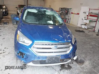 2017 Ford Escape SE z VIN 1FMCU9GD2HUB99955, wystawiony jako IAAI lot #41572200 z przebiegiem 63 023 mil mil oraz . Historia ofert i sprzedaży dostępna na DreamBid. Obrazek 12.