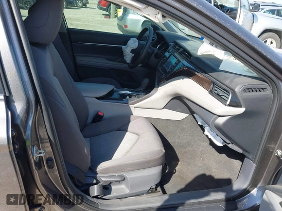 2019 Toyota Camry LE with VIN 4T1B11HK9KU810347, listed as a IAAI auction lot 41804007 with 75,063 mi miles and . Bid and sale history available at DreamBid. Image 5.