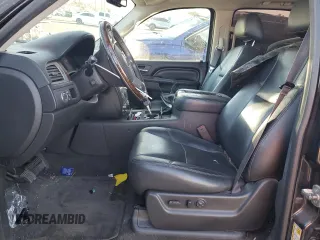 2013 GMC Yukon Denali with VIN 1GKS1EEF0DR205906, listed as a Copart auction lot 87969385 with 128,283 mi miles and Salvage Title. Bid and sale history available at carsss.com. Image 7.