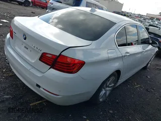 2014 BMW 5 Series 528i xDrive with VIN WBA5A7C5XED614926, listed as a IAAI auction lot 41535739 with 187,586 mi miles and . Bid and sale history available at DreamBid. Image 4.