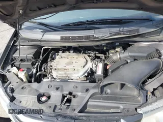 2014 Honda Odyssey Touring with VIN 5FNRL5H92EB073085, listed as a IAAI auction lot 42065913 with 120,834 mi miles and . Bid and sale history available at DreamBid. Image 10.