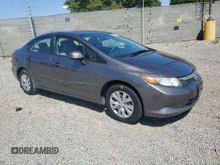 2012 Honda Civic LX z VIN 2HGFB2F5XCH517276, wystawiony jako Copart lot #59443775 z przebiegiem 98 749 mil mil oraz Szkoda całkowita • Salvage title. Historia ofert i sprzedaży dostępna na DreamBid. Obrazek 4.
