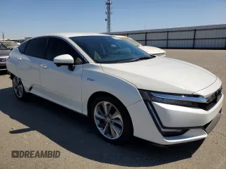 2018 Honda Clarity Plug-In Hybrid with VIN JHMZC5F11JC013897, listed as a Copart auction lot 68315094 with 99,486 mi miles and Salvage Title. Bid and sale history available at carsss.com. Image 4.