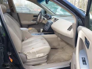 2003 Nissan Murano SL with VIN JN8AZ08W23W212374, listed as a IAAI auction lot 41937611 with 146,922 mi miles. Bid and sale history available at carsss.com. Image 5.