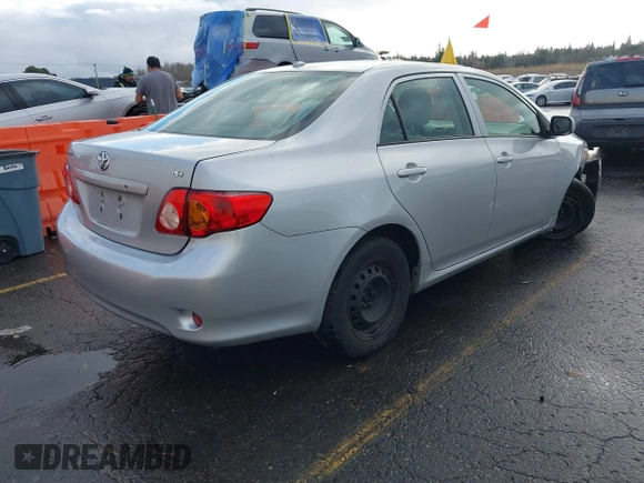 2009 Toyota Corolla with VIN 1NXBU40E39Z131392, listed as a IAAI auction lot 41194018 with 136,031 mi miles. Bid and sale history available at carsss.com. Image 4.