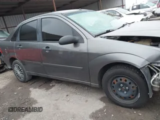 2007 Ford Focus S with VIN 1FAFP34NX7W158498, listed as a IAAI auction lot 41241970 with 119,933 mi miles and . Bid and sale history available at carsss.com. Image 14.
