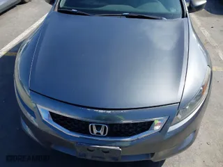 2009 Honda Accord Cpe EX-L with VIN 1HGCS22859A004074, listed as a IAAI auction lot 41590821 with 164,101 mi miles. Bid and sale history available at carsss.com. Image 6.