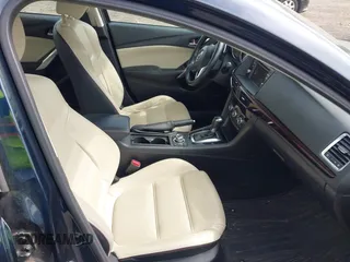 2015 Mazda 6 i Grand Touring with VIN JM1GJ1W53F1200121, listed as a IAAI auction lot 42173036 with 76,184 mi miles and . Bid and sale history available at DreamBid. Image 5.