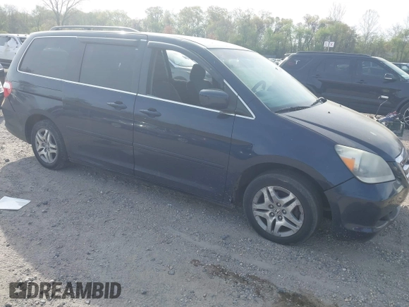 2005 Honda Odyssey EX with VIN 5FNRL38455B135555, listed as a IAAI auction lot 42080079 with 149,468 mi miles and . Bid and sale history available at carsss.com. Image 1.
