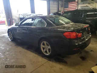 2015 BMW 4 Series 428i xDrive with VIN WBA3T1C58FP820289, listed as a Copart auction lot 84008124 with 67,675 mi miles and Salvage Title. Bid and sale history available at carsss.com. Image 2.