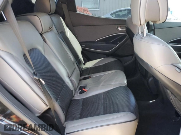 2017 Hyundai Santa Fe 2.4L z VIN 5XYZU3LB5HG392277, wystawiony jako Copart lot #51601765 z przebiegiem 81 943 mil mil oraz Szkoda całkowita • Salvage title. Historia ofert i sprzedaży dostępna na DreamBid. Obrazek 11.