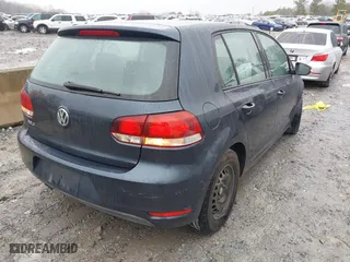 2012 Volkswagen Golf with VIN WVWDB7AJ4CW308026, listed as a IAAI auction lot 41553950 with 151,000 mi miles. Bid and sale history available at carsss.com. Image 4.