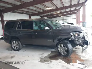 2017 Chevrolet Tahoe LT with VIN 1GNSKBKC8HR326004, listed as a IAAI auction lot 42256494 with 101,486 mi miles and . Bid and sale history available at DreamBid. Image 14.