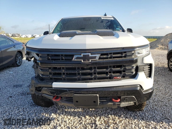 2023 Chevrolet Silverado 1500 LT Trail Boss with VIN 3GCUDFE8XPG329141, listed as a Copart auction lot 65902224 with 10,132 mi miles and Salvage Title. Bid and sale history available at DreamBid. Image 5.